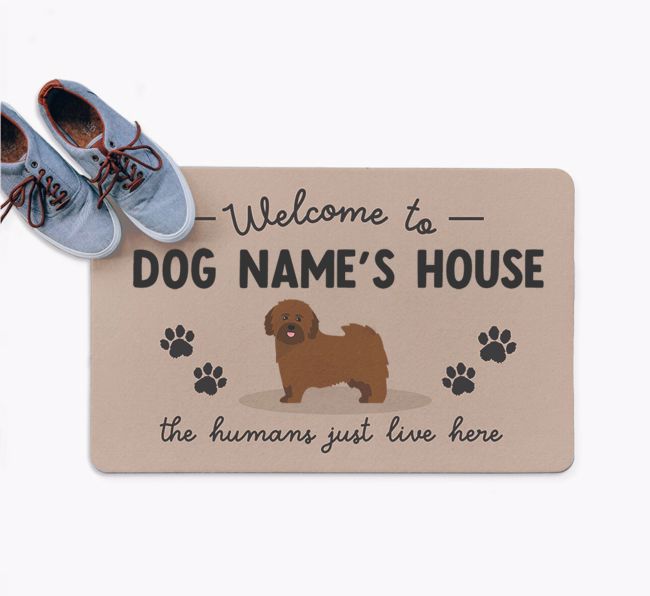 The Humans Just Live Here: Personalized {breedFullName} Doormat